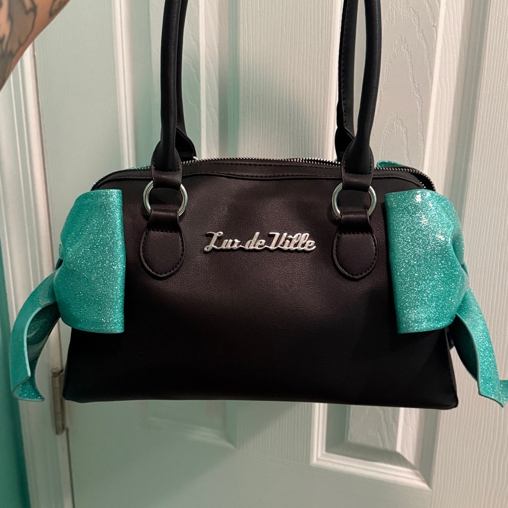 Lux de Ville Black Handbag with Glittery “mermaid blue” Bows